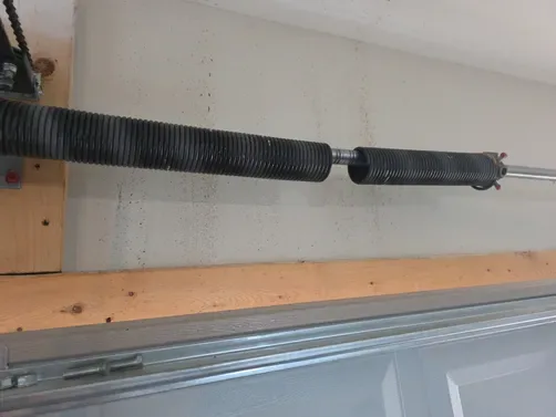 Signs of a Failing Garage Door System: When to Call for Broken Garage Door Spring Replacement in Franklin