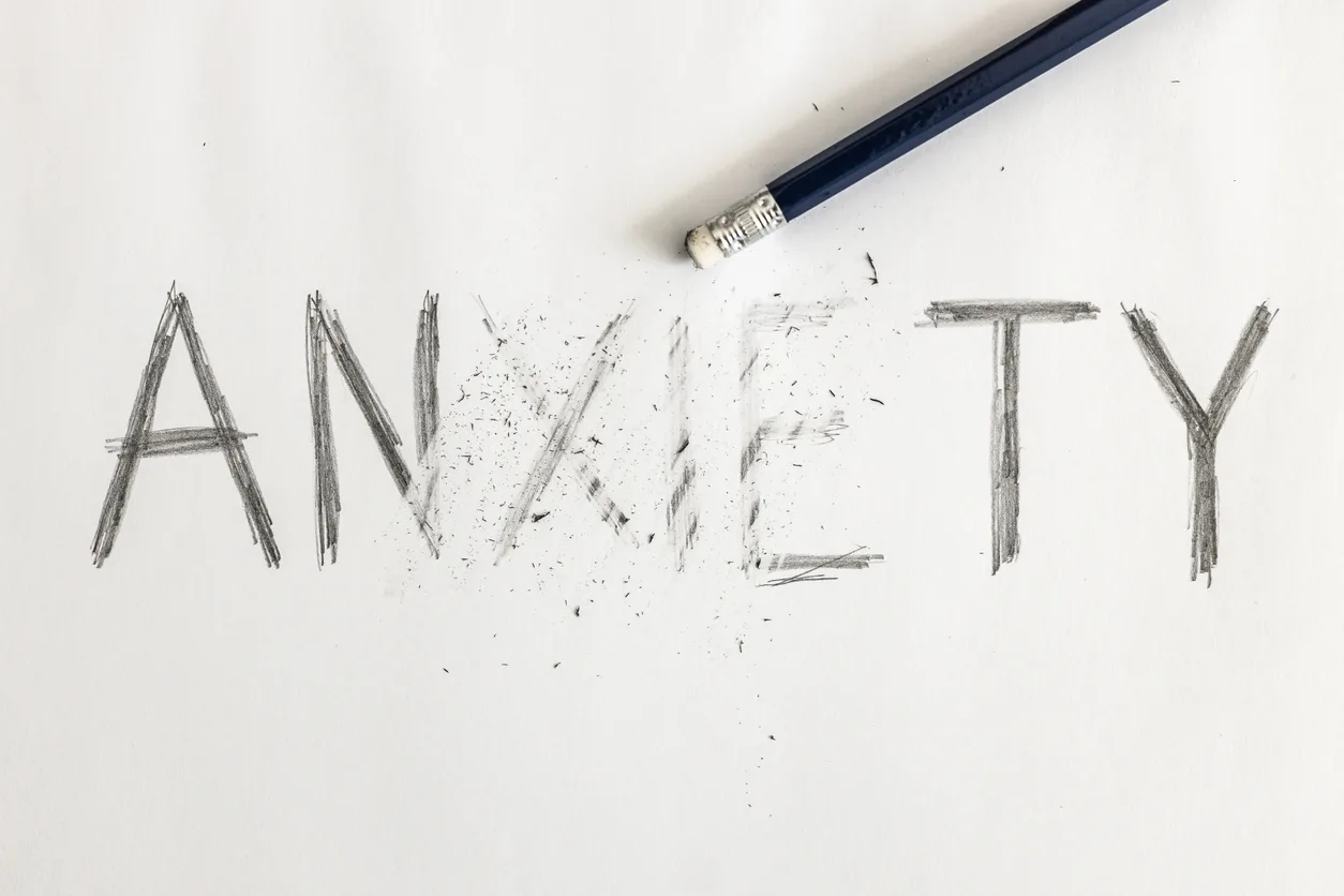 What does anxiety stomach pain feel like?