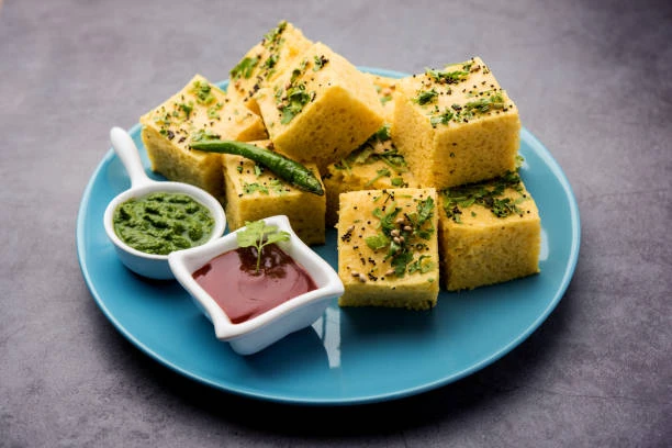 What are some must-try Gujarati foods in NYC?