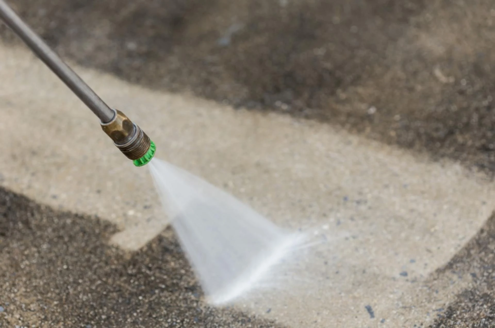 Why Industrial-Grade Chemicals Matter When Pressure Washing Concrete